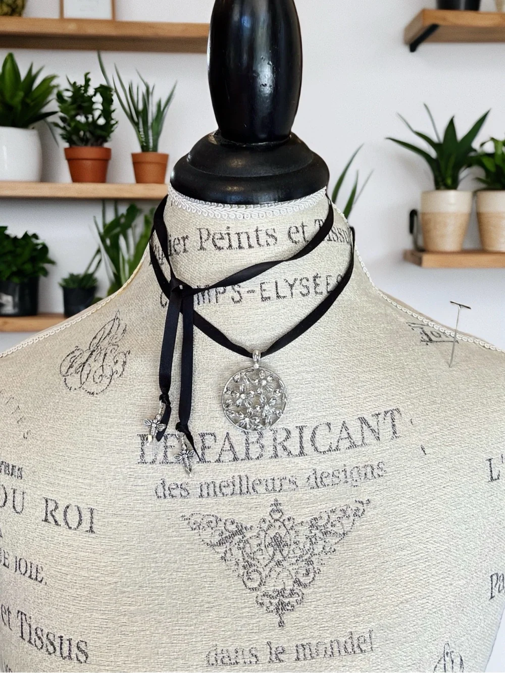 Silver Toned Floral Cutout Pendant Necklace on Black Satin Ribbon